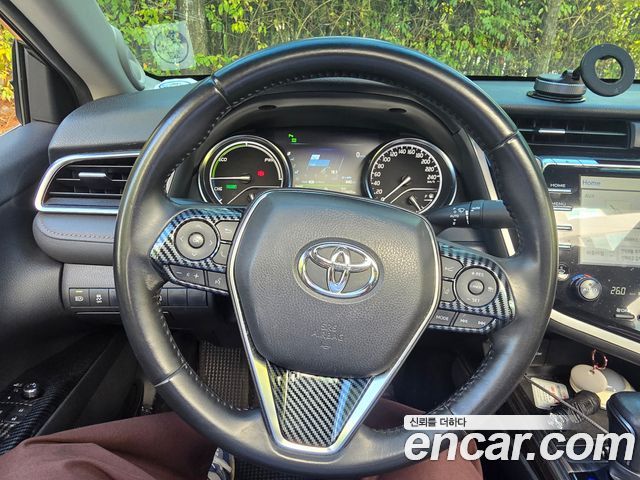Toyota Camry 2.5 XLE Hybrid — пробег 229 609 км — фото 4 из 5