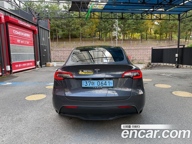 Tesla Model Y Long Range AWD — пробег 97 300 км — фото 2 из 5