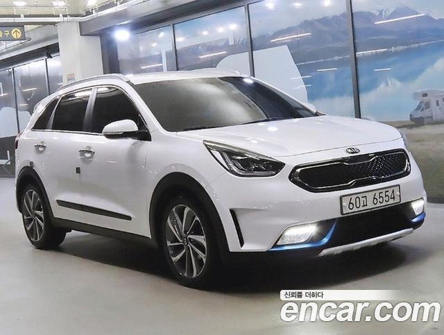 Kia Niro Prestige — пробег 144 966 км — фото 2 из 5