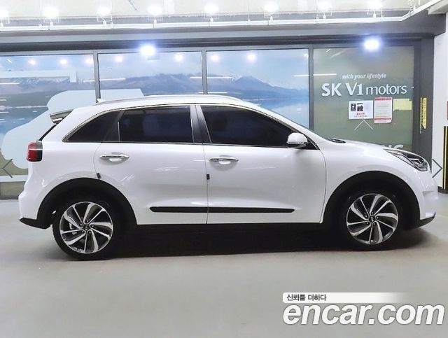 Kia Niro Prestige — пробег 144 966 км — фото 4 из 5
