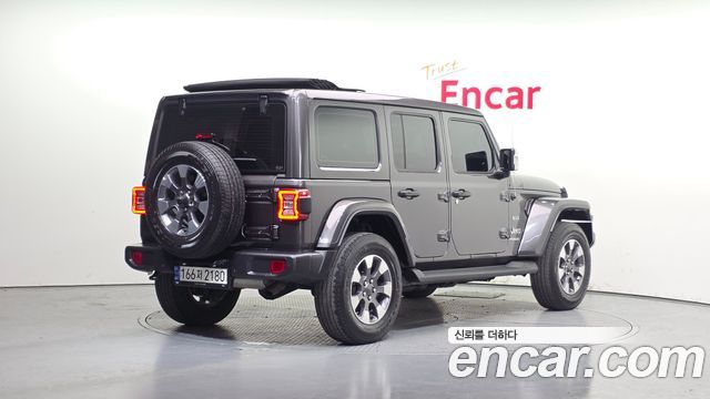 Jeep Wrangler 2.0 Overland Power Top 4Door — пробег 130 594 км — фото 2 из 5