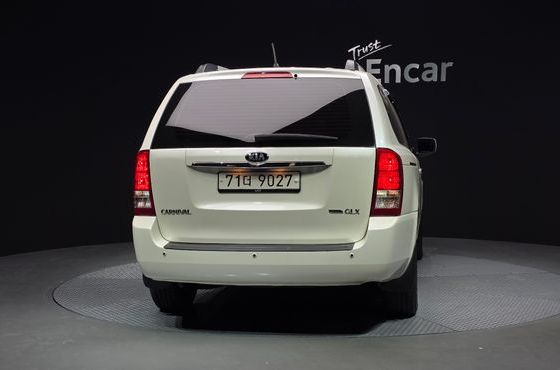 Kia Carnival GLX — пробег 394 058 км — фото 4 из 5