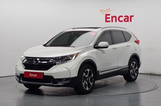 Honda CR-V 1.5 Touring 4WD — пробег 133 193 км — фото 1 из 5
