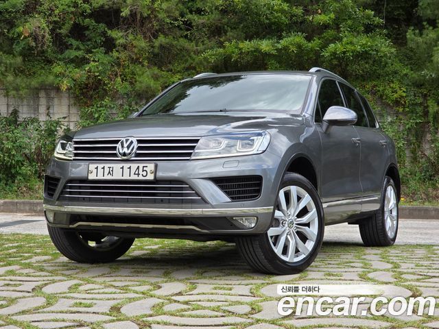 Volkswagen Touareg V6 3.0 TDI Bluemotion Premium 7P5 — пробег 267 268 км — фото 1 из 5