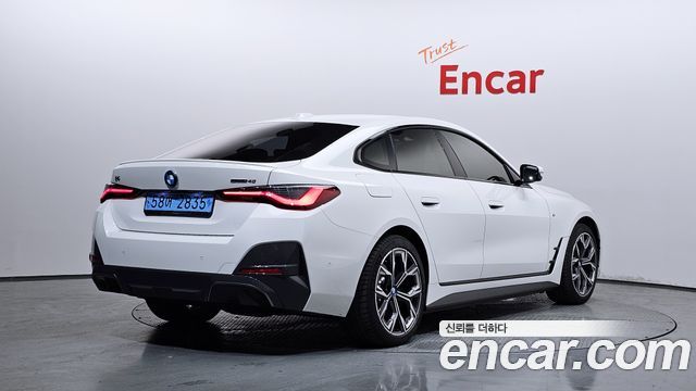 BMW i4 eDrive40 M Sports Pro — пробег 22 415 км — фото 2 из 5