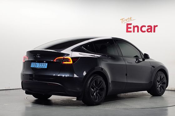 Tesla Model Y RWD — пробег 13 790 км — фото 2 из 5