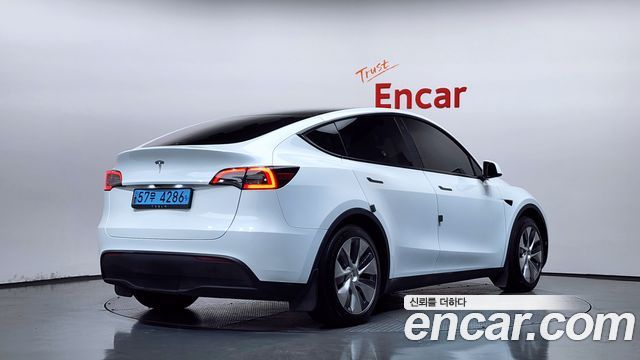 Tesla Model Y RWD — пробег 105 816 км — фото 2 из 5