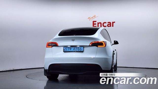 Tesla Model Y RWD — пробег 105 816 км — фото 4 из 5