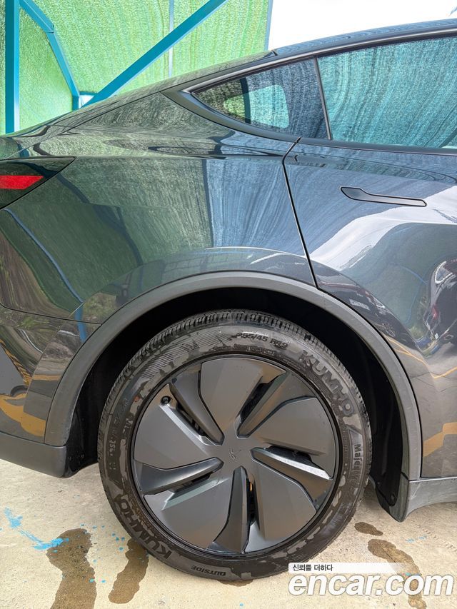 Tesla Model Y Long Range AWD — пробег 50 000 км — фото 2 из 5