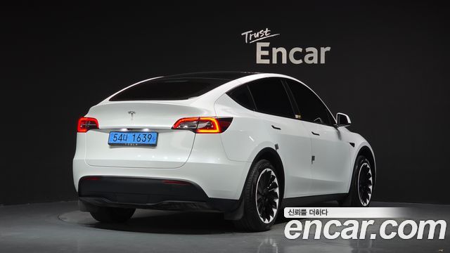 Tesla Model Y RWD — пробег 39 154 км — фото 2 из 5