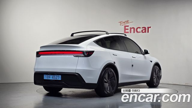 Tesla Model Y RWD — пробег 23 574 км — фото 2 из 5