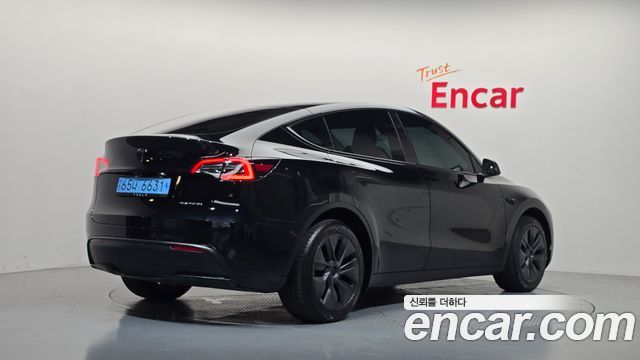 Tesla Model Y Long Range AWD — пробег 11 992 км — фото 2 из 5