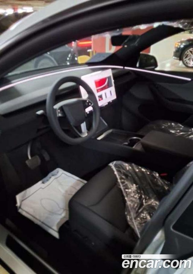 Tesla Model Y Premium RWD — пробег 1 км — фото 4 из 5