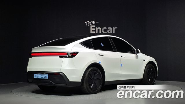 Tesla Model Y RWD — пробег 23 385 км — фото 2 из 5