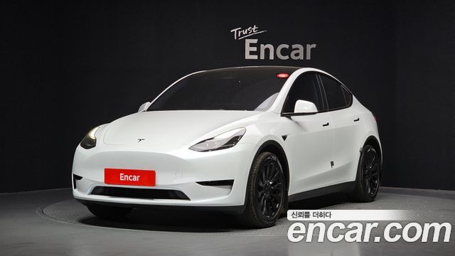 Tesla Model Y RWD — пробег 34 470 км — фото 1 из 5