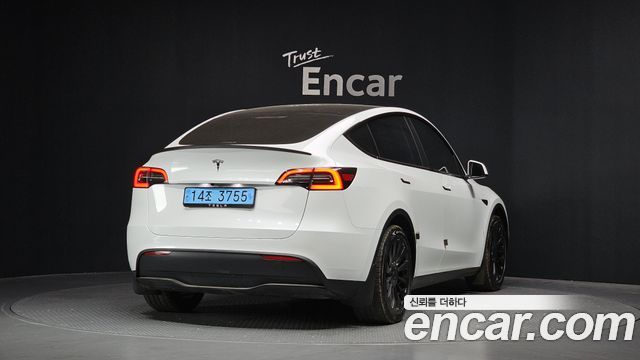 Tesla Model Y RWD — пробег 34 470 км — фото 2 из 5