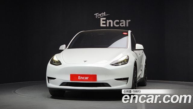 Tesla Model Y RWD — пробег 34 470 км — фото 3 из 5