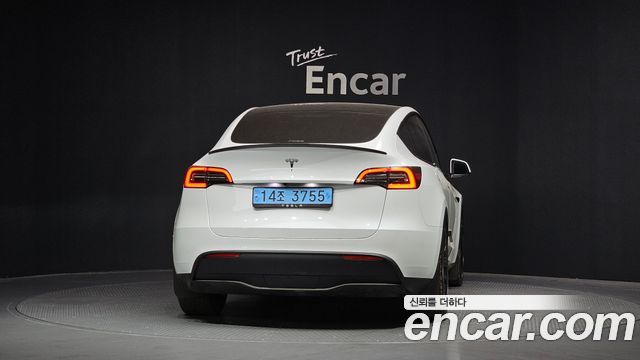 Tesla Model Y RWD — пробег 34 470 км — фото 4 из 5