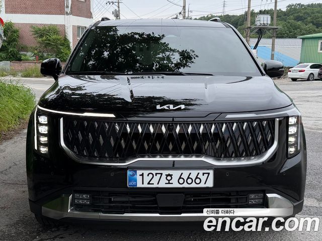 Kia Carnival HEV 9seater Signature — пробег 1 630 км — фото 1 из 5