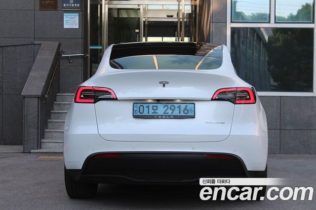 Tesla Model Y Premium Long Range AWD — пробег 149 800 км — фото 4 из 5