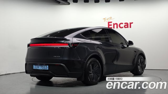 Tesla Model Y Long Range AWD — пробег 27 748 км — фото 2 из 5