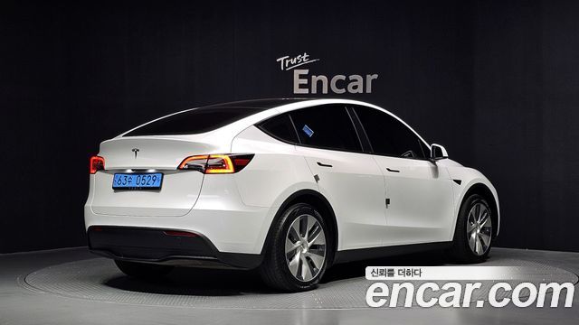 Tesla Model Y RWD — пробег 38 836 км — фото 2 из 5