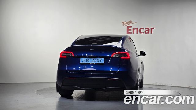 Tesla Model Y RWD — пробег 23 180 км — фото 4 из 5