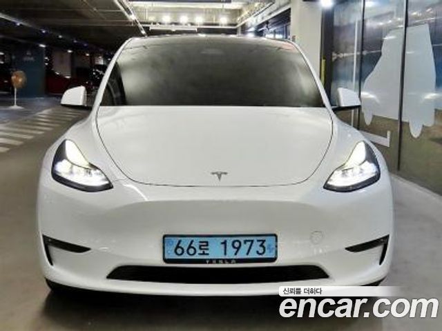 Tesla Model Y Performance AWD — пробег 33 100 км — фото 1 из 5