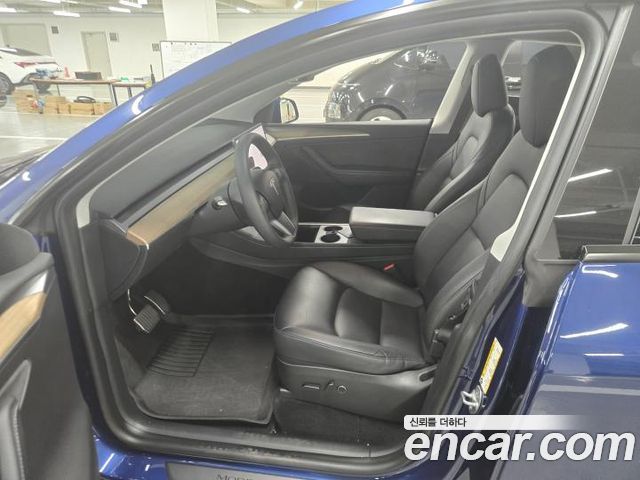 Tesla Model Y RWD — пробег 42 783 км — фото 5 из 5