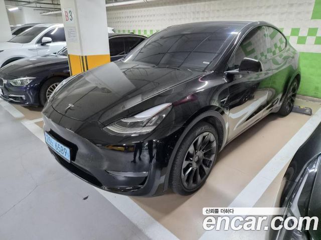 Tesla Model Y Long Range AWD — пробег 119 999 км — фото 2 из 5