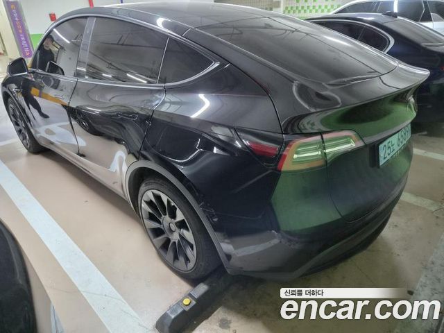 Tesla Model Y Long Range AWD — пробег 119 999 км — фото 3 из 5