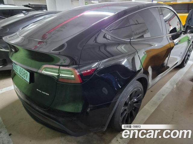 Tesla Model Y Long Range AWD — пробег 119 999 км — фото 4 из 5