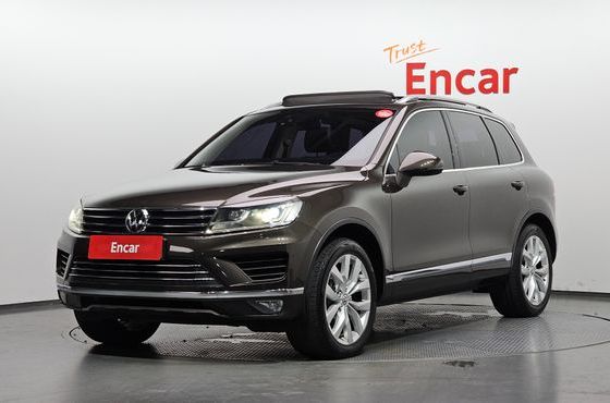 Volkswagen Touareg V6 3.0 TDI Bluemotion Premium 7P5 — пробег 256 586 км — фото 1 из 5