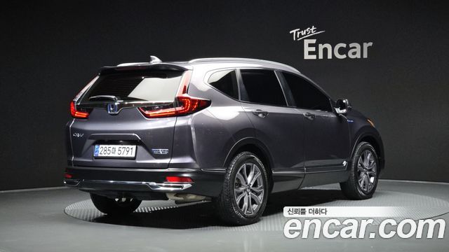 Honda CR-V 2.0 Hybrid Touring 4WD — пробег 85 847 км — фото 2 из 5