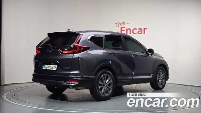 Honda CR-V 2.0 Hybrid Touring 4WD — пробег 37 595 км — фото 2 из 5