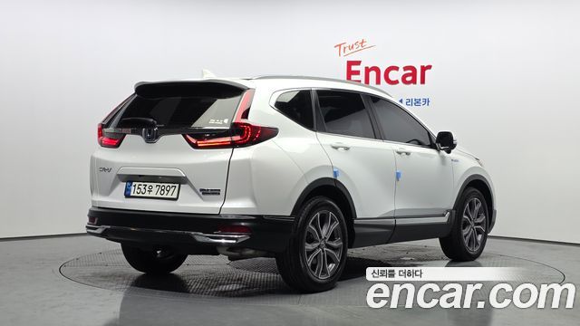Honda CR-V 2.0 Hybrid Touring 4WD — пробег 67 368 км — фото 2 из 5