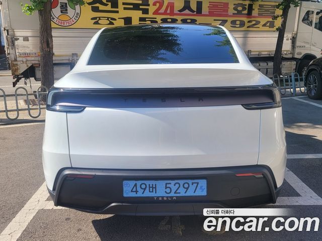 Tesla Model Y Premium RWD — пробег 2 100 км — фото 5 из 5