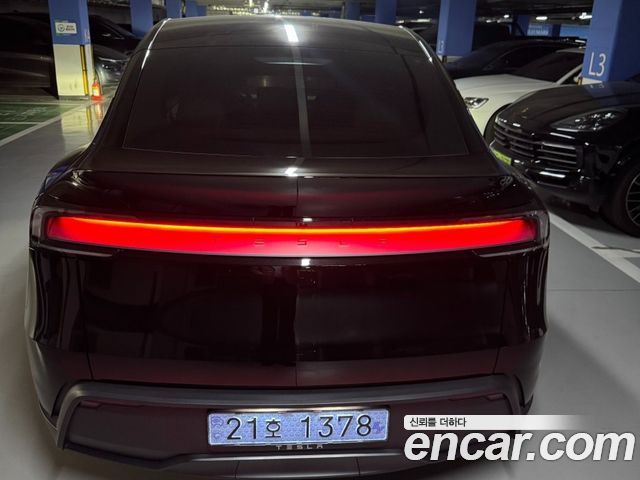 Tesla Model Y Premium RWD — пробег 1 127 км — фото 4 из 5