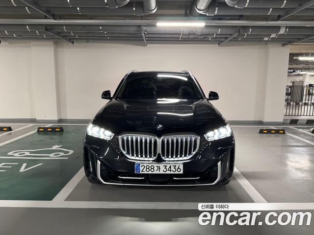 BMW X5 xDrive 50e xLine — пробег 32 210 км — фото 2 из 5