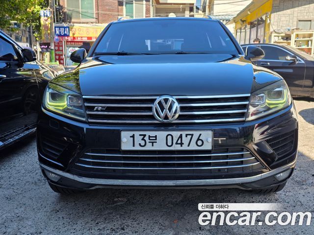 Volkswagen Touareg V6 3.0 TDI Bluemotion Premium 7P5 — пробег 187 752 км — фото 1 из 5