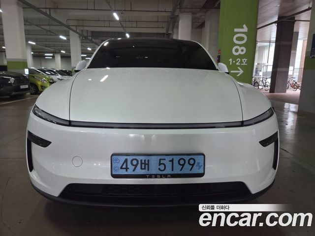 Tesla Model Y L Long Range AWD — пробег 1 758 км — фото 1 из 5
