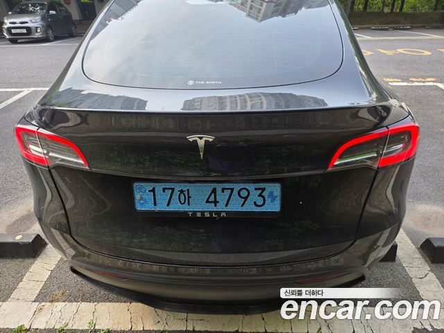 Tesla Model Y RWD — пробег 13 000 км — фото 4 из 5