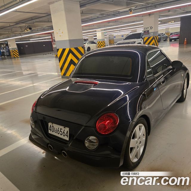 Daihatsu Copen 0.6 — пробег 89 000 км — фото 4 из 5