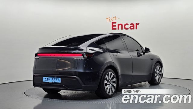 Tesla Model Y Long Range AWD — пробег 29 698 км — фото 2 из 5