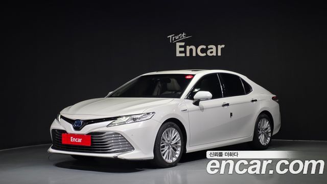 Toyota Camry 2.5 XLE Hybrid — пробег 102 702 км — фото 1 из 5