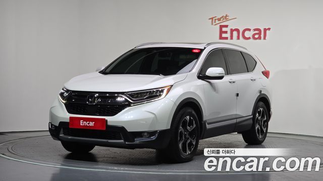 Honda CR-V 1.5 Touring 4WD — пробег 145 008 км — фото 1 из 5