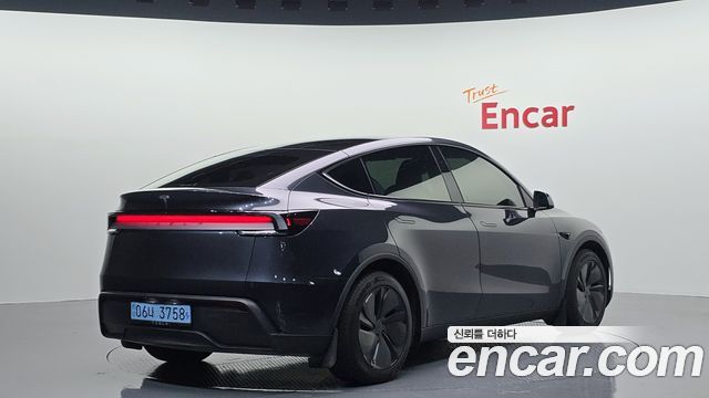 Tesla Model Y RWD — пробег 13 089 км — фото 2 из 5