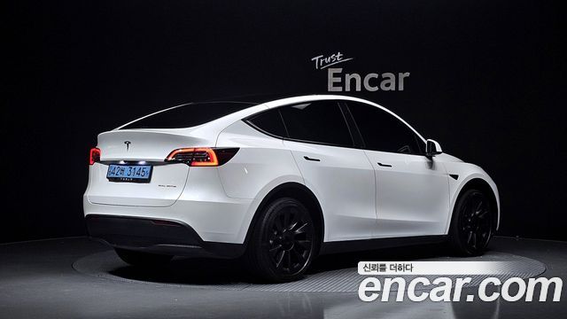 Tesla Model Y Long Range AWD — пробег 73 588 км — фото 2 из 5