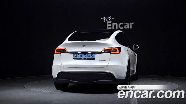Tesla Model Y Long Range AWD — пробег 73 588 км — фото 4 из 5