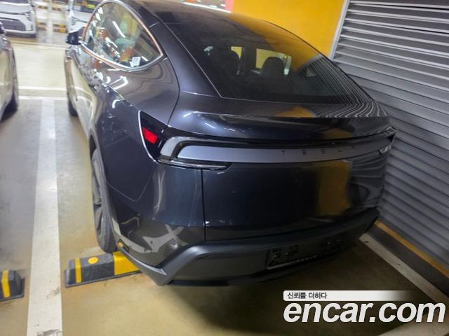 Tesla Model Y Premium RWD — пробег 1 км — фото 4 из 5